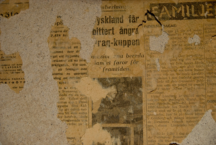 損毀嚴重的舊報紙-配圖與原文無關(guān)